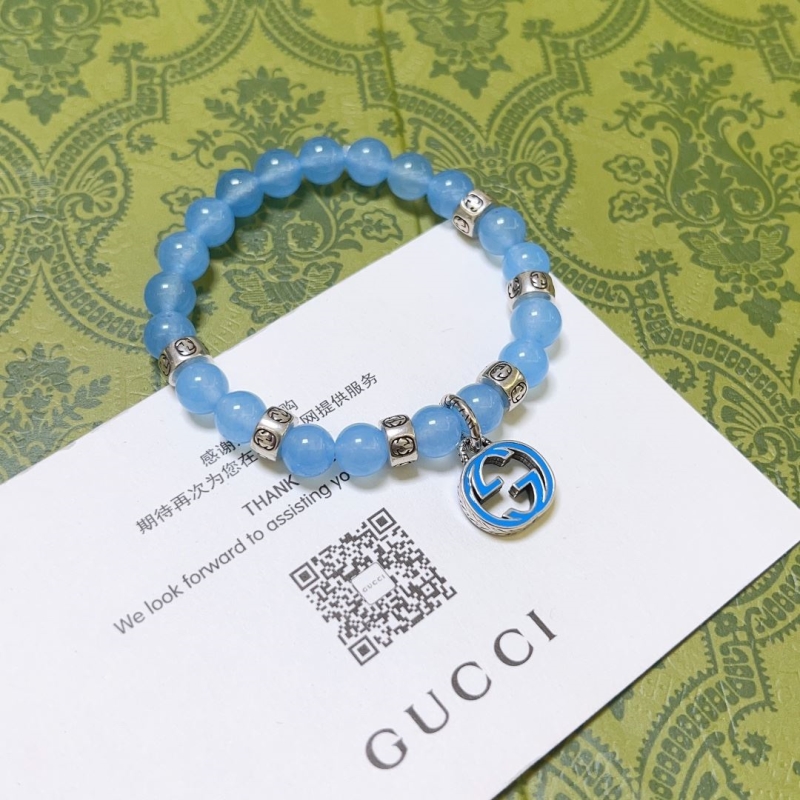 G*u*i bracelets